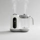 Hachoir bébé multifonction 50-400ml vapeur et mixage 450W en situation d'utilisation